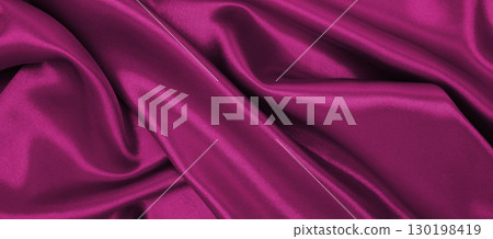 Smooth elegant pink silk or satin luxury cloth texture as abstract background. Luxurious valentines day background design 130198419