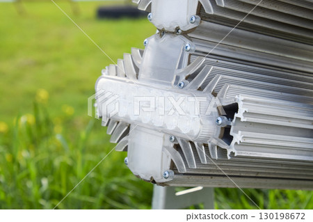 streetlight illuminator is installed on the lawn. streetlight illuminator is installed on the lawn. 130198672