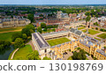 Aerial view of Cambridge University colleges, river Cam and green lawns in summer 130198769