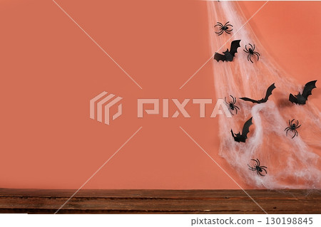 Happy halloween concept, background with spiders and bats in the web with place for text, greeting card or banner, template for design, selective focus 130198845