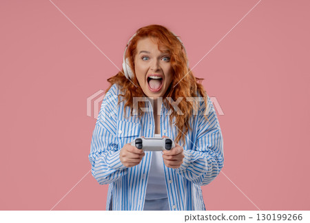 Young Pretty Gamer Woman Playing Online Video Game On Console With Joystick Young Pretty Gamer Woman Playing Online Video Game On Console With Joystick 130199266