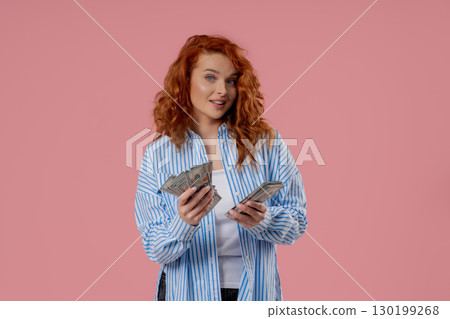 Rich Ginger Woman Counting Usd Cash Money Dollars On Pink,Income payment, salary 130199268