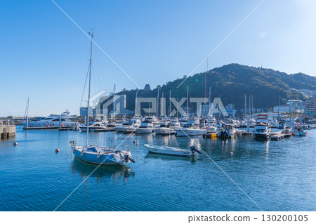 A view of Atami's boat yard lined with privately owned cruisers 130200105