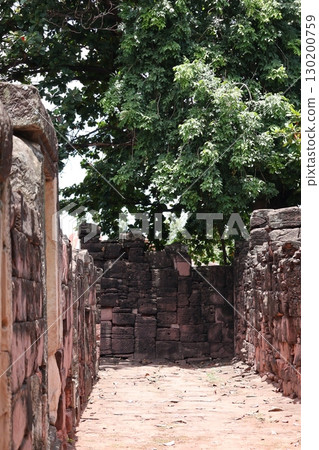 Landscape of a road with green leaves and stone walls Landscape of a road with green leaves and stone walls 130200759