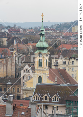 Close-up view of the Church of St. Anne with its distinctive green dome and baroque architecture Close-up view of the Church of St. Anne with its distinctive green dome and baroque architecture 130201107