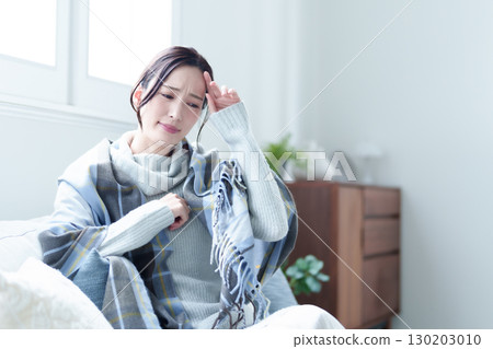 Woman headache feeling unwell Woman headache feeling unwell 130203010