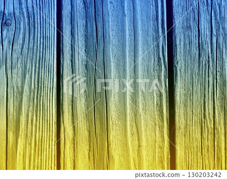 Wooden plank background in Ukrainian style, painted in the colors of the Ukrainian flag 130203242