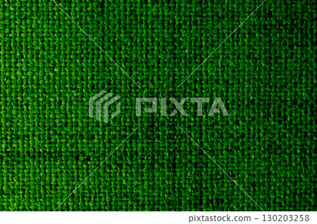 Green upholstery fabric texture with cross weave, burlap background Green upholstery fabric texture with cross weave, burlap background 130203258