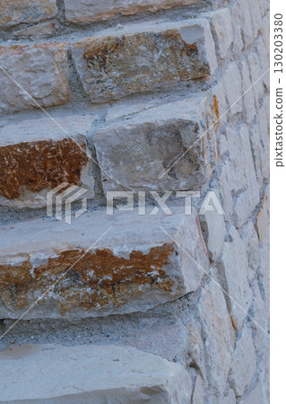 Stone steps built from natural masonry blocks 130203380