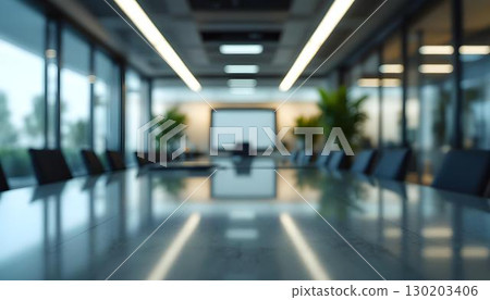 A professional meeting space with a conference table and chairs, arranged for productive office meetings and teamwork 130203406