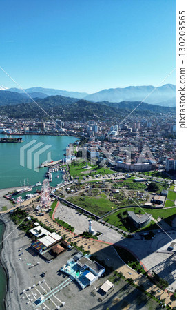 Batumi, Georgia: Aerial View of a Modern City with Port, Skyscrapers, and Breathtaking Nature Batumi, Georgia: Aerial View of a Modern City with Port, Skyscrapers, and Breathtaking Nature 130203565