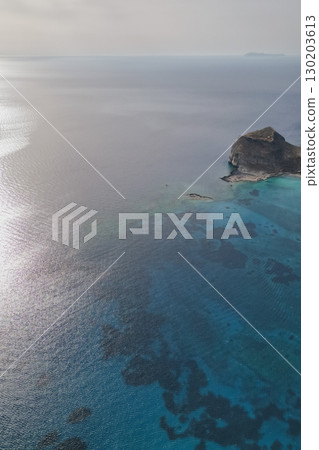 Scenic place with clear blue water and rocky formations Balos lagoon Crete Scenic place with clear blue water and rocky formations Balos lagoon Crete 130203613