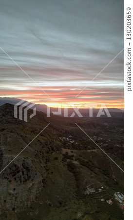 Magnificent sunset over the mountains, vertical view 130203659