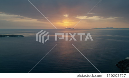 Incredible sunset over Santorini Greece, drone view Incredible sunset over Santorini Greece, drone view 130203727