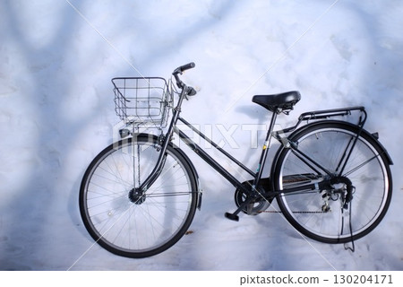 Bicycle on the snow 130204171