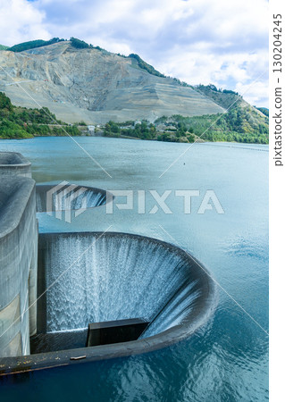 Flow of the Aodo Dam with two spillways in Koka City, Shiga Prefecture Flow of the Aodo Dam with two spillways in Koka City, Shiga Prefecture 130204245