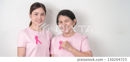 Couple woman with pink Ribbon for Pink October Breast Cancer Awareness month, May Women Health, November Birth Parents Adoption, women rights, Empowerment, March International Women day and Cancer day Couple woman with pink Ribbon for Pink October Breast Cancer Awareness month, May Women Health, November Birth Parents Adoption, women rights, Empowerment, March International Women day and Cancer day 130204725