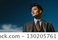 Businessman with blue sky background | Suit, career, business scene 130205761