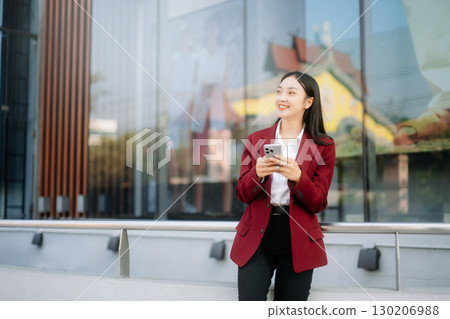 oung Asian business woman leader entrepreneur, professional manager holding digital tablet computer oung Asian business woman leader entrepreneur, professional manager holding digital tablet computer 130206988