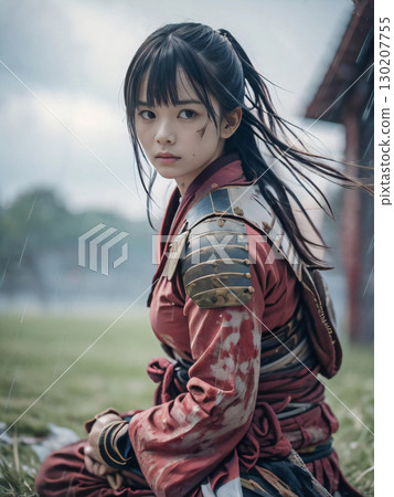 A young female samurai in armor fighting on a rainy Sengoku period battlefield A young female samurai in armor fighting on a rainy Sengoku period battlefield 130207755