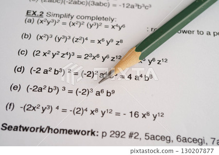 Pencil on mathematic formula exercise test paper in education school. Pencil on mathematic formula exercise test paper in education school. 130207877