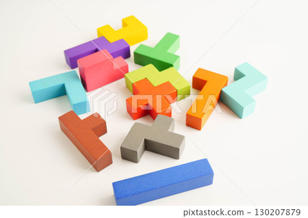 Logical thinking and problem solving problem solution creative business, wooden puzzle geometric block shape. 130207879