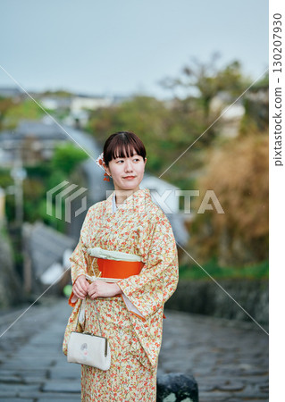 A woman in a kimono strolling through the castle town A woman in a kimono strolling through the castle town 130207930