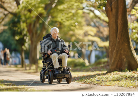 Japanese man riding a senior car: Supporting independence and safe mobility (welfare, transportation, health) 130207984
