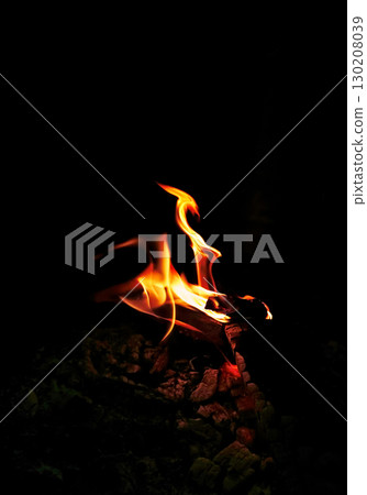 Sacred Fire Flames Burning in Ritual with Ashes 130208039