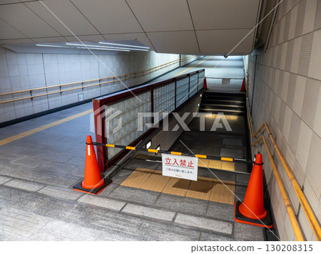 No trespassing: An underground passageway in the city center with a low ceiling that has been dug down for safety reasons 130208315