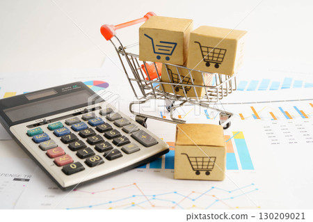 Online shopping, Shopping cart box on business graph, import export, finance commerce. Online shopping, Shopping cart box on business graph, import export, finance commerce. 130209021