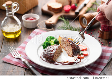 A hot and juicy demi-glace hamburger steak with a glossy sauce that will whet your appetite. A hot and juicy demi-glace hamburger steak with a glossy sauce that will whet your appetite. 130209362