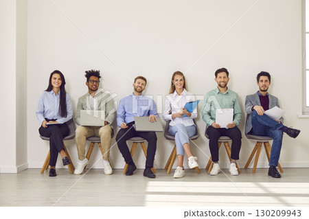 Group of diverse people at a business seminar, corporate meeting, or job interview 130209943