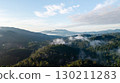 Morning mist in the forest and mountains 130211283