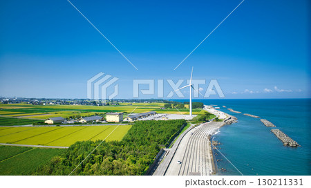 Offshore wind turbines and the Kurobe River alluvial fan at Shimoniikawa Coast in Toyama Prefecture at the end of August 130211331