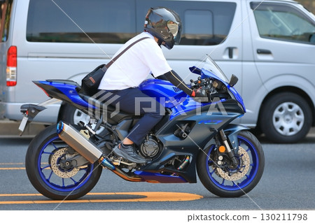 A moving motorcycle 130211798