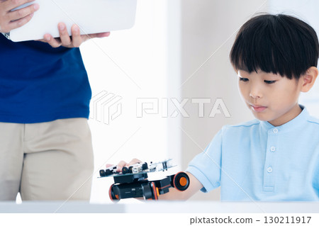 Boys studying at a programming school Boys studying at a programming school 130211917