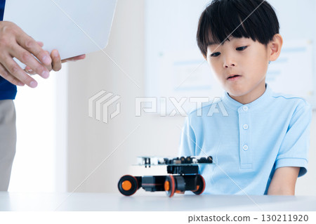 Boys studying at a programming school Boys studying at a programming school 130211920