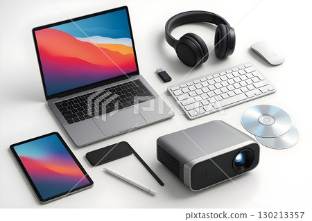 A stylish flat lay of modern technology gadgets including a laptop, tablet, headphones, keyboard 130213357