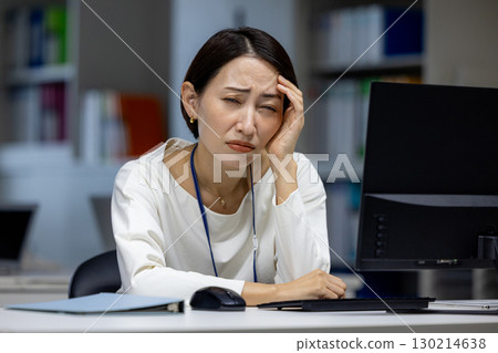 A woman with overtime A woman with overtime 130214638