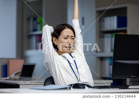A woman with overtime A woman with overtime 130214644