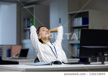 A woman with overtime A woman with overtime 130214645