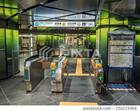 The ticket gates of Ginza Station on the Tokyo Metro Ginza and Hibiya lines, located in the underground passageway in the city center 130215468