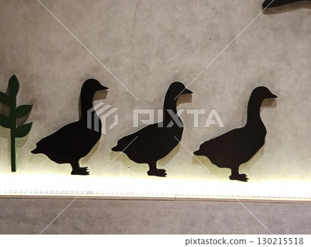 black and white duck on vintage wood background 130215518