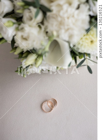 Romantic wedding rings and bouquet Romantic wedding rings and bouquet 130216521