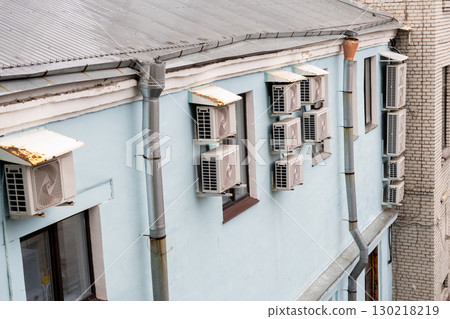 air conditioners are installed on the wall of the building. cooling in hot weather. air conditioners are installed on the wall of the building. cooling in hot weather. 130218219