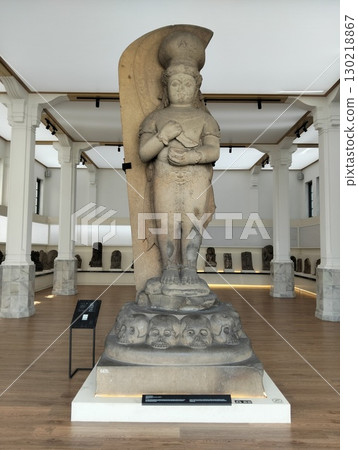 Stone Statue of a Deity at a Museum 130218867