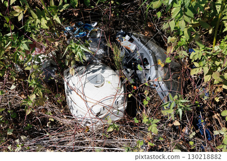 Illegally discarded garbage 130218882