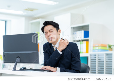 Tired middle-aged businessman in the office 130220398