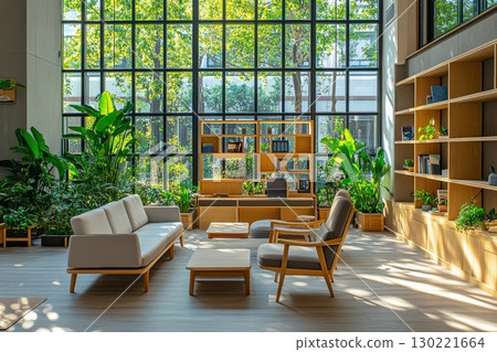 Relaxing lounge area surrounded by lush greenery modern space indoor garden bright atmosphere inviting view comfort and nature 130221664